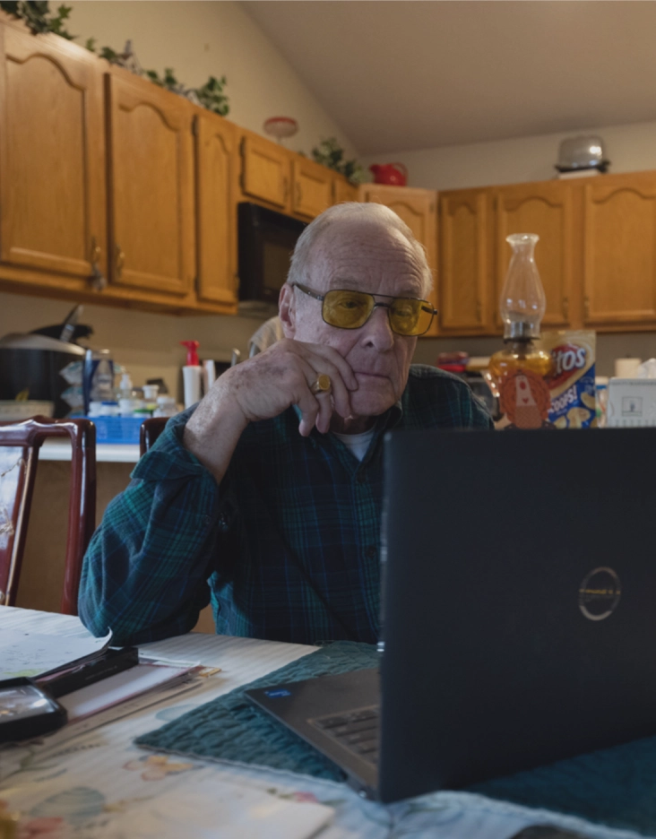 Dad and son looking at a computer